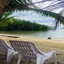 On the beach, beach umbrellas, rowing