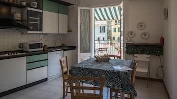 Apartment, 2 Bedrooms | Private kitchen | Full-size fridge, microwave, oven, stovetop