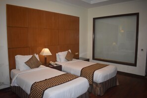 Kamar Double atau Twin Deluks, 1 kamar tidur, akses difabel, pemandangan kebun | 1 kamar tidur, seprai premium, brankas, dan meja kerja