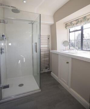 Bathtub, hair dryer, towels, soap