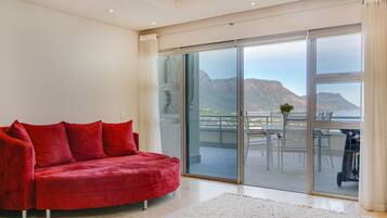 Deluxe Apartment, 3 Bedrooms | Living area | TV