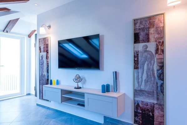 Apartamento (Premium One Bedroom Apartment with Ba) | Sala de estar | TV de tela plana