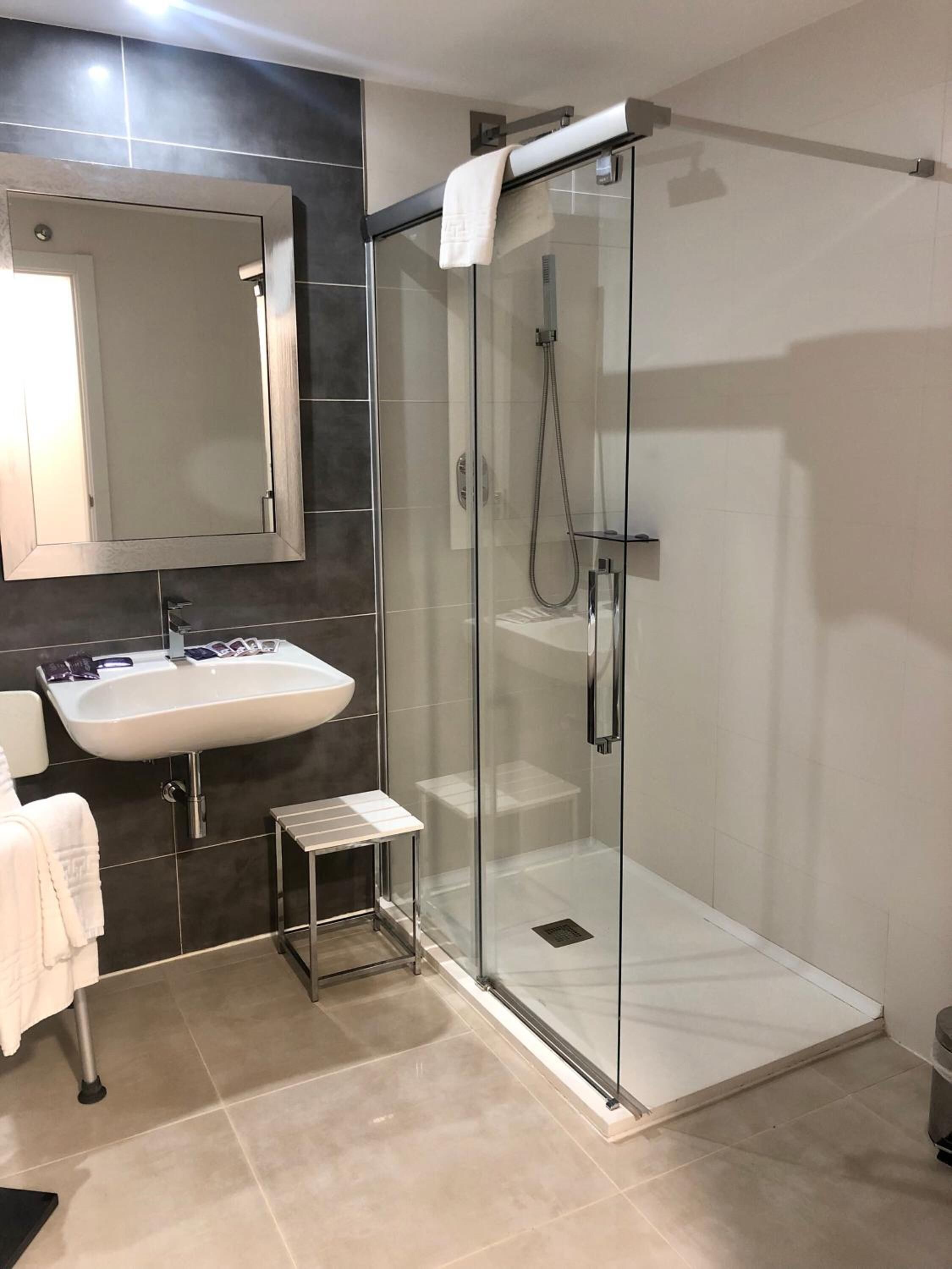 shower, free toiletries, hair dryer, bathrobes