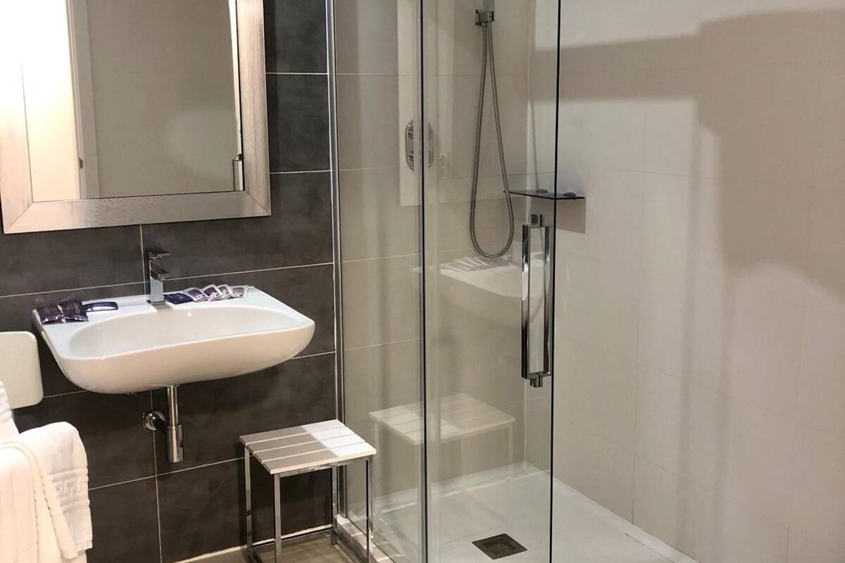 shower, free toiletries, hair dryer, bathrobes