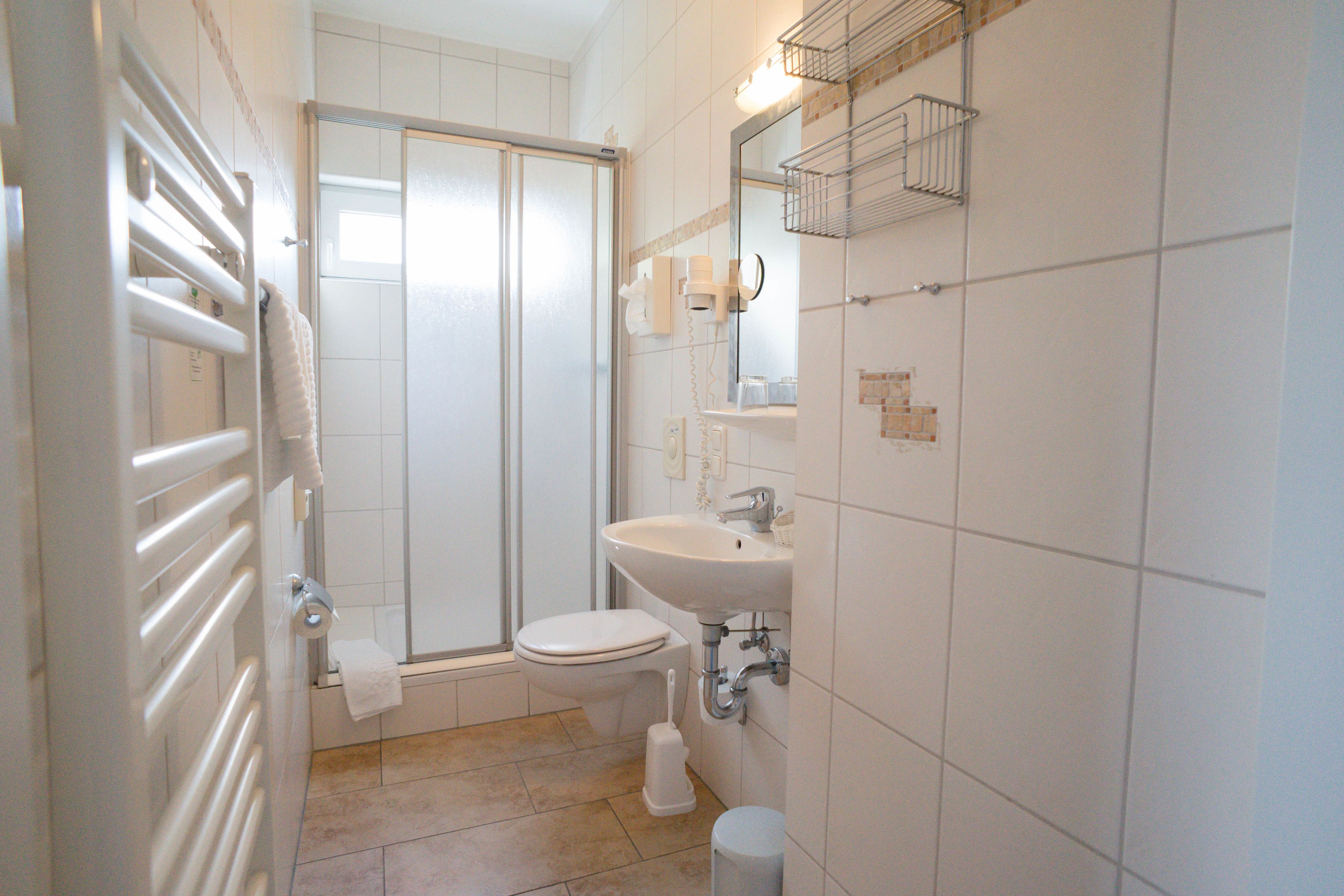 shower, free toiletries, hair dryer, towels