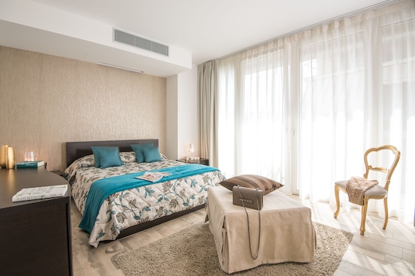 Apartamento, 2 habitaciones (4) | Edredones de plumas y minibar (con algunos artículos gratuitos)