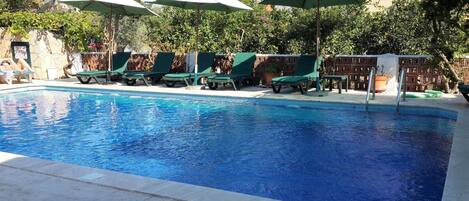 Outdoor pool, sun loungers