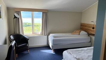 Standard Twin Room, Private Bathroom | Desk, laptop workspace, blackout drapes, soundproofing