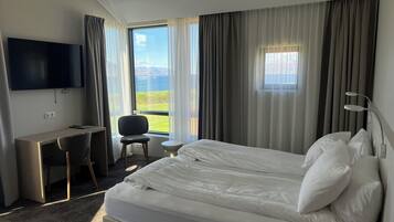 Comfort Room | Desk, laptop workspace, blackout curtains, soundproofing