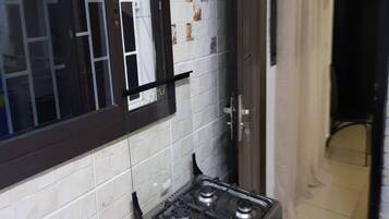 Apartment | Private kitchen | Full-sized fridge, microwave, oven, stovetop