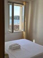 Apartment, 1 Bedroom, Sea View | Free WiFi, bed sheets
