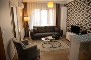 Kahden hengen huone (kaksi sänkyä) | Oleskelualue | Lämmitetyt lattiat