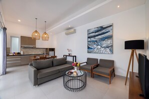 One Bedroom Pool Villa | Living area | LCD TV - Hideaway Villas Bali – Ungasan by Kanaan Hospitality (Ungasan)