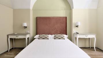 Down duvets, pillow-top beds, desk, blackout curtains