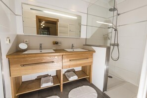 Shower, hair dryer, towels, toilet paper