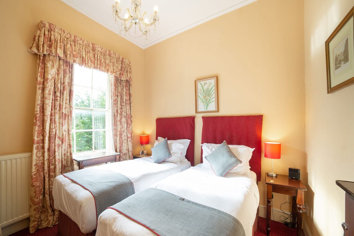 Standard Twin Room, 2 Twin Beds | In-room safe, individually decorated, desk, iron/ironing board
