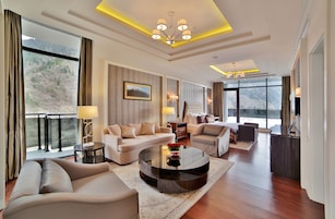 Presidential Suite | Living room | 40-inch Smart TV with cable channels