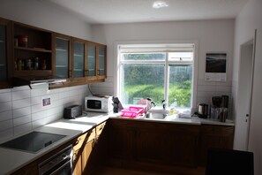 Quarto casal econômico, banheiro compartilhado | Cozinha compartilhada