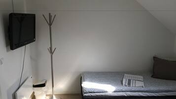 Blackout curtains, iron/ironing board, free WiFi, bed sheets