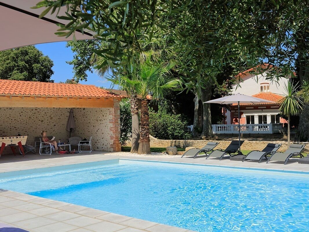 Outdoor pool, a heated pool, sun loungers