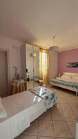 Triple Room | Down comforters, memory foam beds, minibar, desk