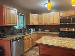 Fridge, microwave, oven, stovetop - Grandview 3BR Mountain Cabin w/ Hot Tub & EV (Green Mountain Falls)
