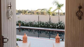 Outdoor pool, pool umbrellas, pool loungers