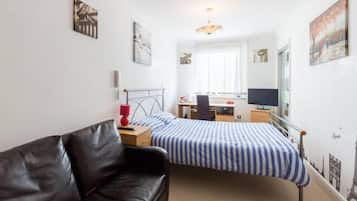 Iron/ironing board, travel crib, free WiFi, bed sheets