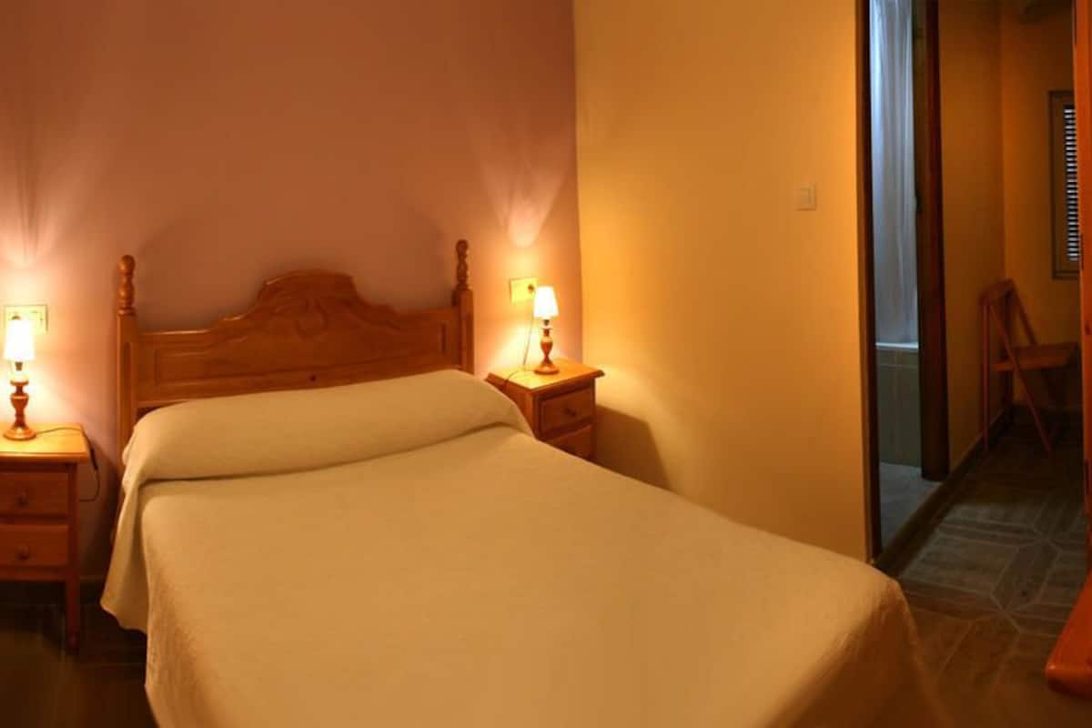 Memory-foam beds, desk, free WiFi