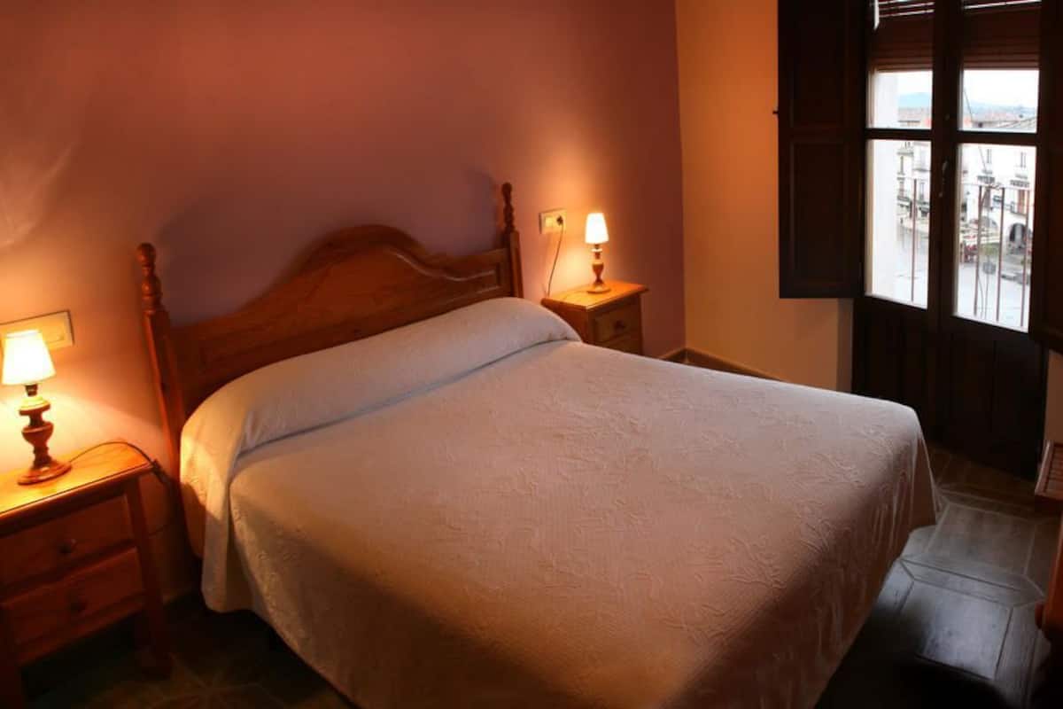 Memory-foam beds, desk, free WiFi