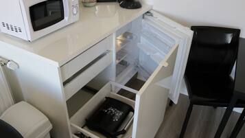 Fridge, microwave, coffee/tea maker, electric kettle