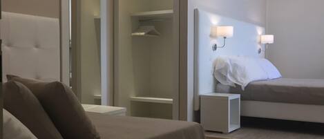 Junior Suite, Multiple Beds | Free WiFi, bed sheets