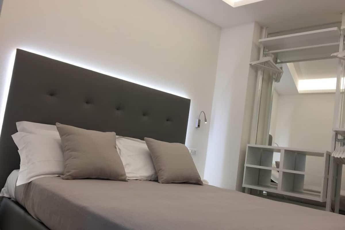 Suite, letti multipli, camere comunicanti | Wi-Fi gratuito, lenzuola