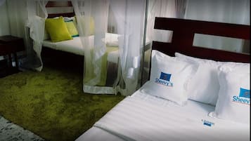 Deluxe-Dreibettzimmer | Minibar, Zimmersafe, Schreibtisch, kostenloses WLAN