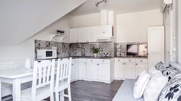 Family Apartment, Balcony | 1 bedroom, desk, iron/ironing board, free WiFi