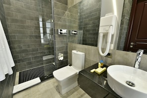 Shower, deep soaking tub, free toiletries, hair dryer