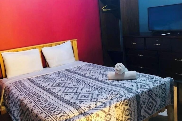 Room, 1 Queen Bed | Iron/ironing board, free WiFi, bed sheets