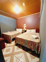 Room, 2 Queen Beds | Iron/ironing board, free WiFi, bed sheets