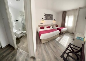 Family Room | Minibar, in-room safe, desk, laptop workspace