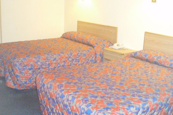 Standard Room, 2 Double Beds, Smoking | Desk, WiFi (free), bed sheets