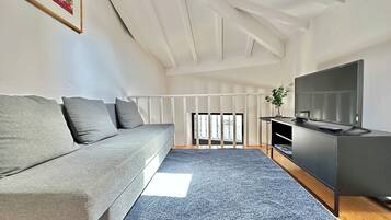 Apartamento, 1 quarto (3) | Área de estar | TV de tela plana