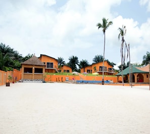 On the beach, white sand, sun loungers, rowing