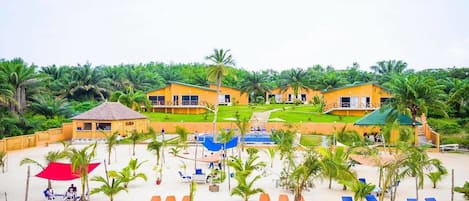 On the beach, white sand, sun loungers, rowing