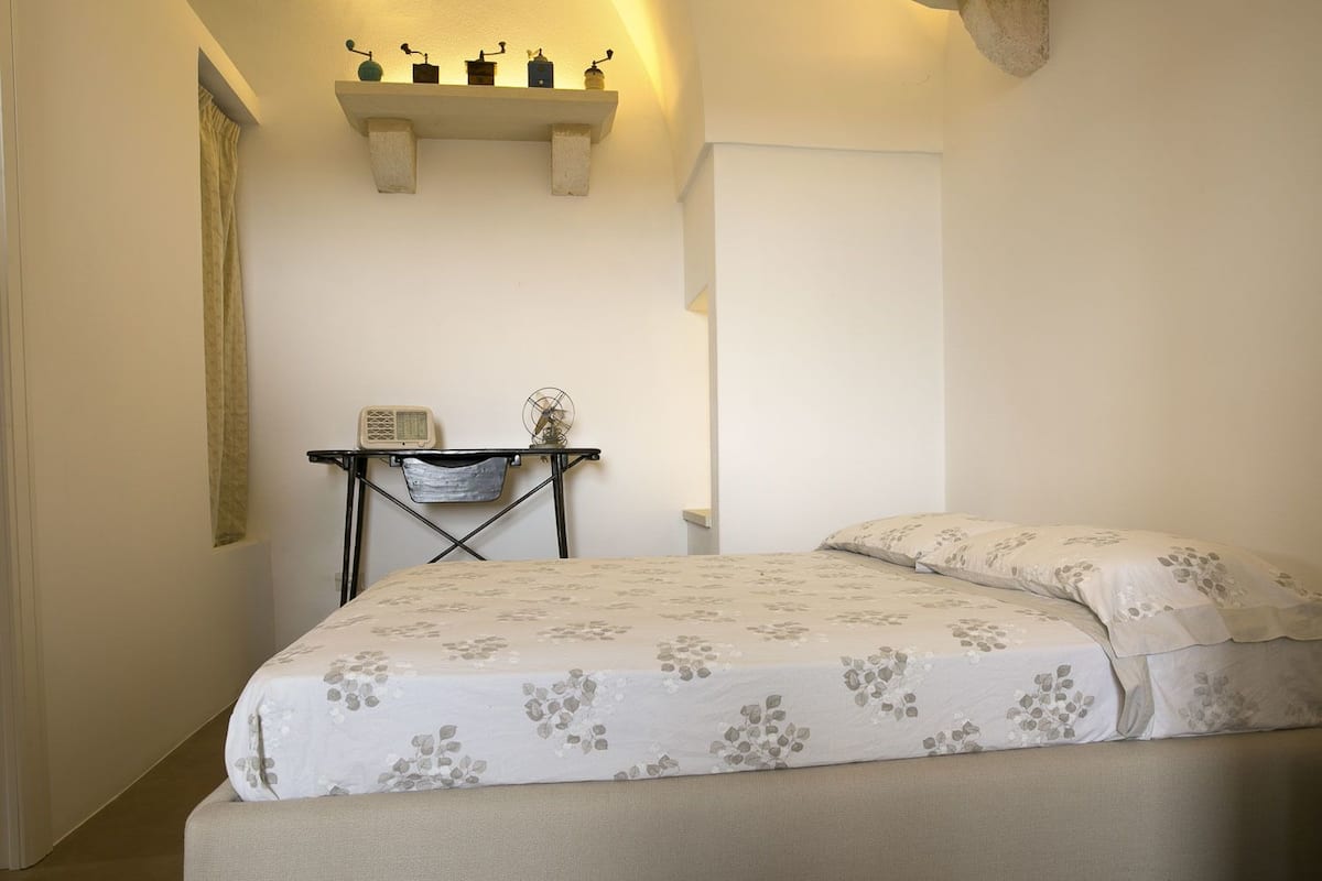 Quadrupla Deluxe, patio, vista giardino | Biancheria da letto di alta qualità, minibar, una cassaforte in camera