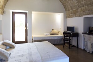 Quadruple Room, Patio, Garden View | Premium bedding, minibar, in-room safe, desk - Tenuta Yala (Parabita)