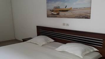 Apartemen Comfort | 1 kamar tidur, Wi-Fi gratis, dan seprai linen