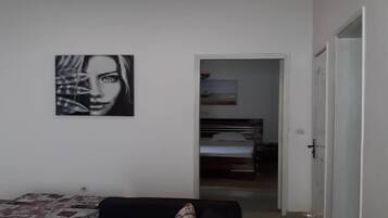 Comfort Apartment | Living area | Plasma TV