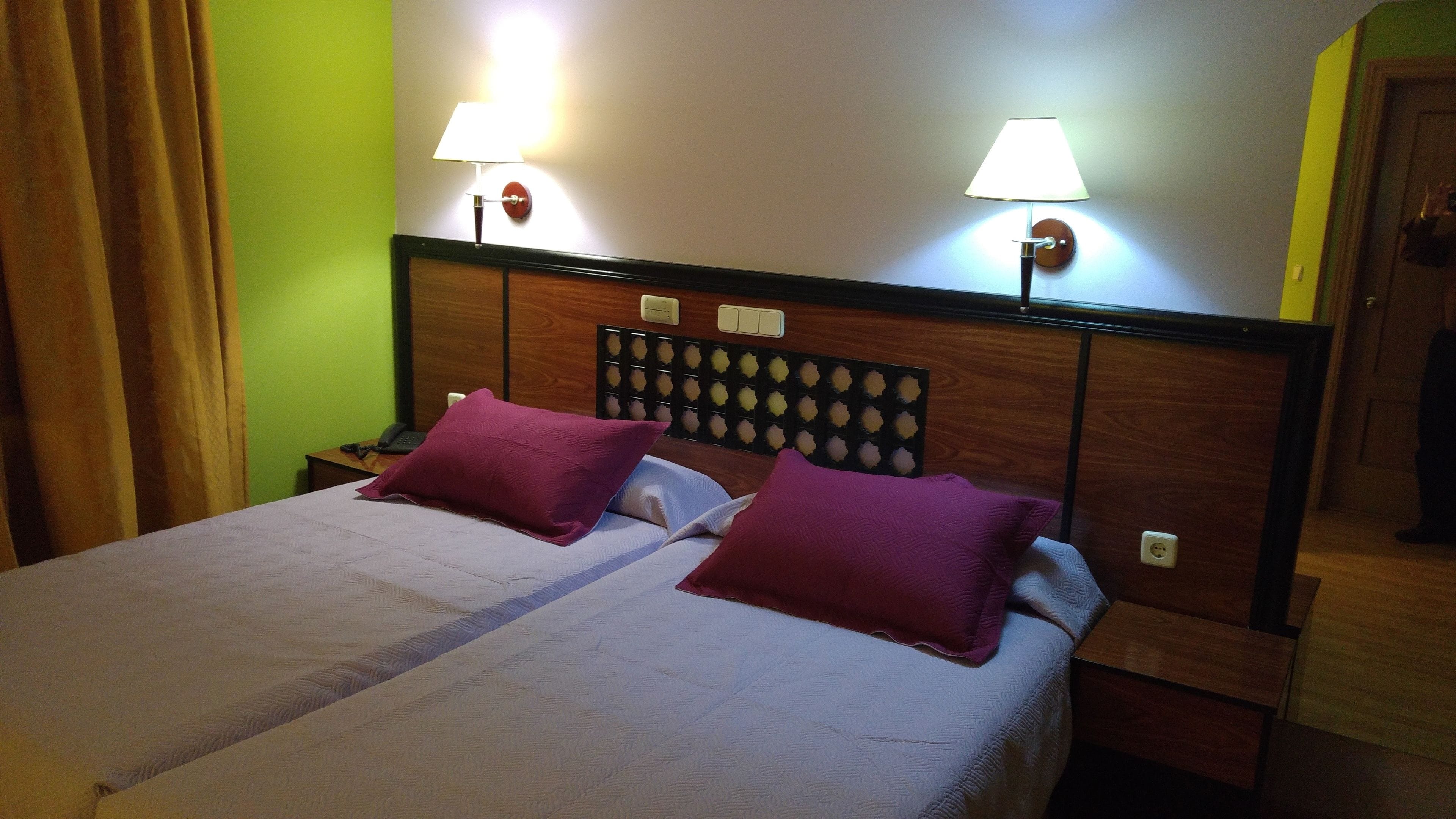 twin room | minibar, in-room safe, desk, blackout curtains