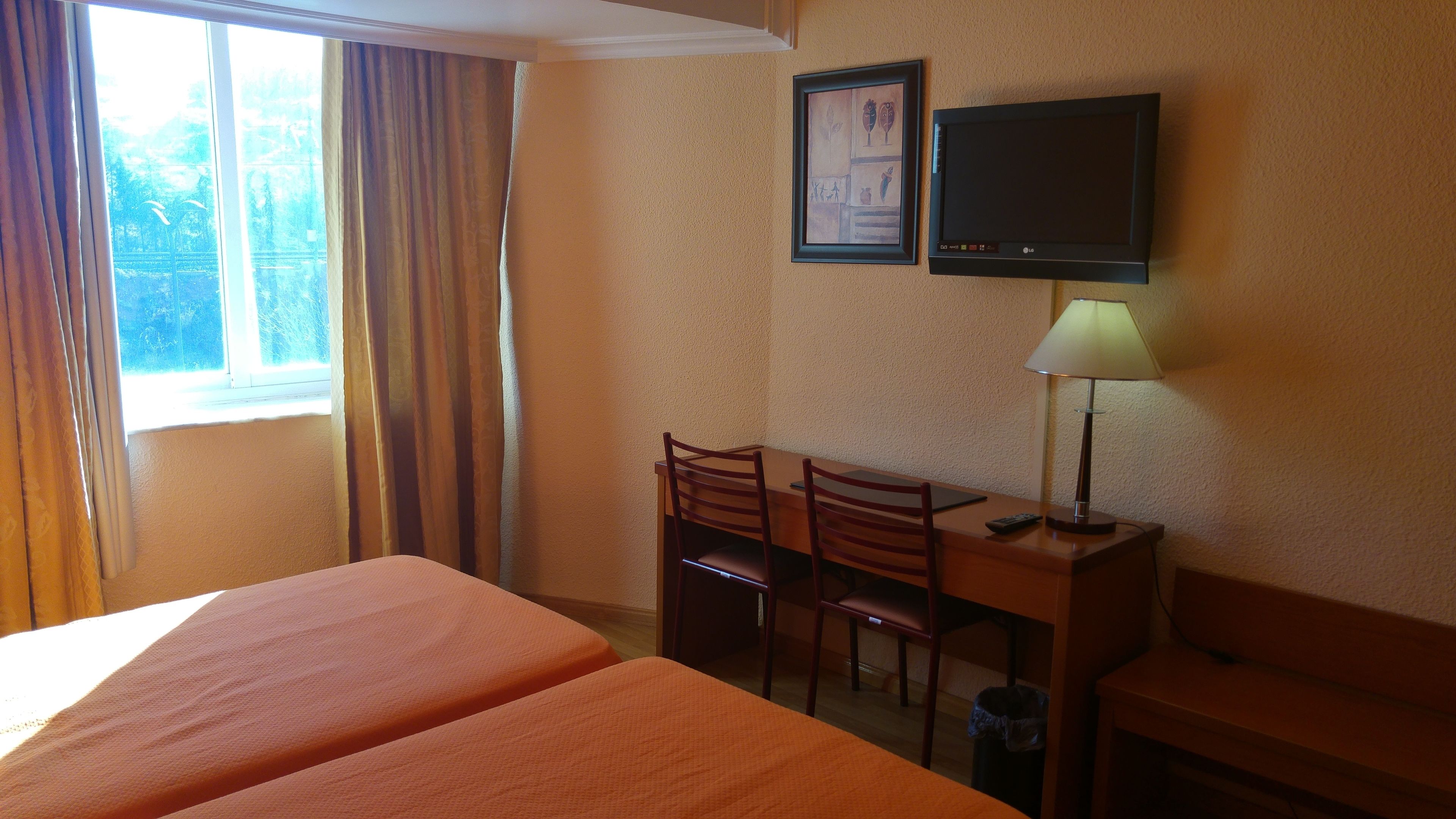 twin room | minibar, in-room safe, desk, blackout curtains