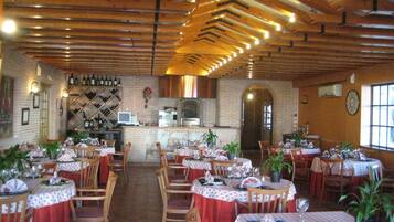 Breakfast, lunch, dinner served; alfresco dining